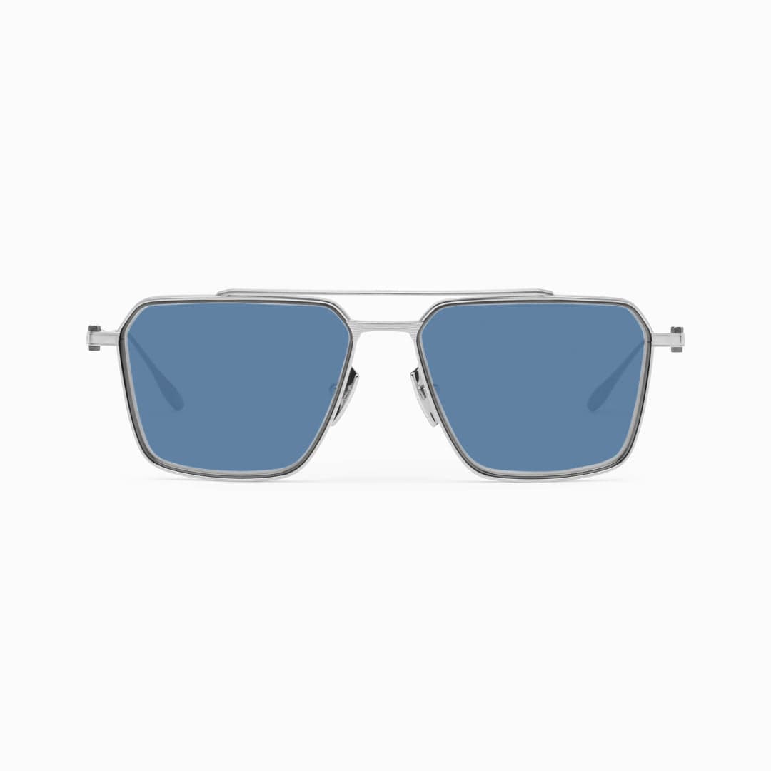 Akoni Telesto titanium aviator sunglasses representing the curated independent inventory at a boutique optical practice