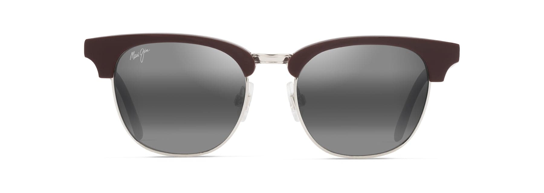Brown frame sunglasses with neutral grey polarized lenses illustrating lens tint pairing with frame style