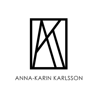 Anna Karin Karlsson logo — Swedish haute couture eyewear with gold and Swarovski details