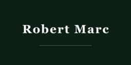 Robert Marc logo — New York luxury boutique eyewear in acetate and titanium